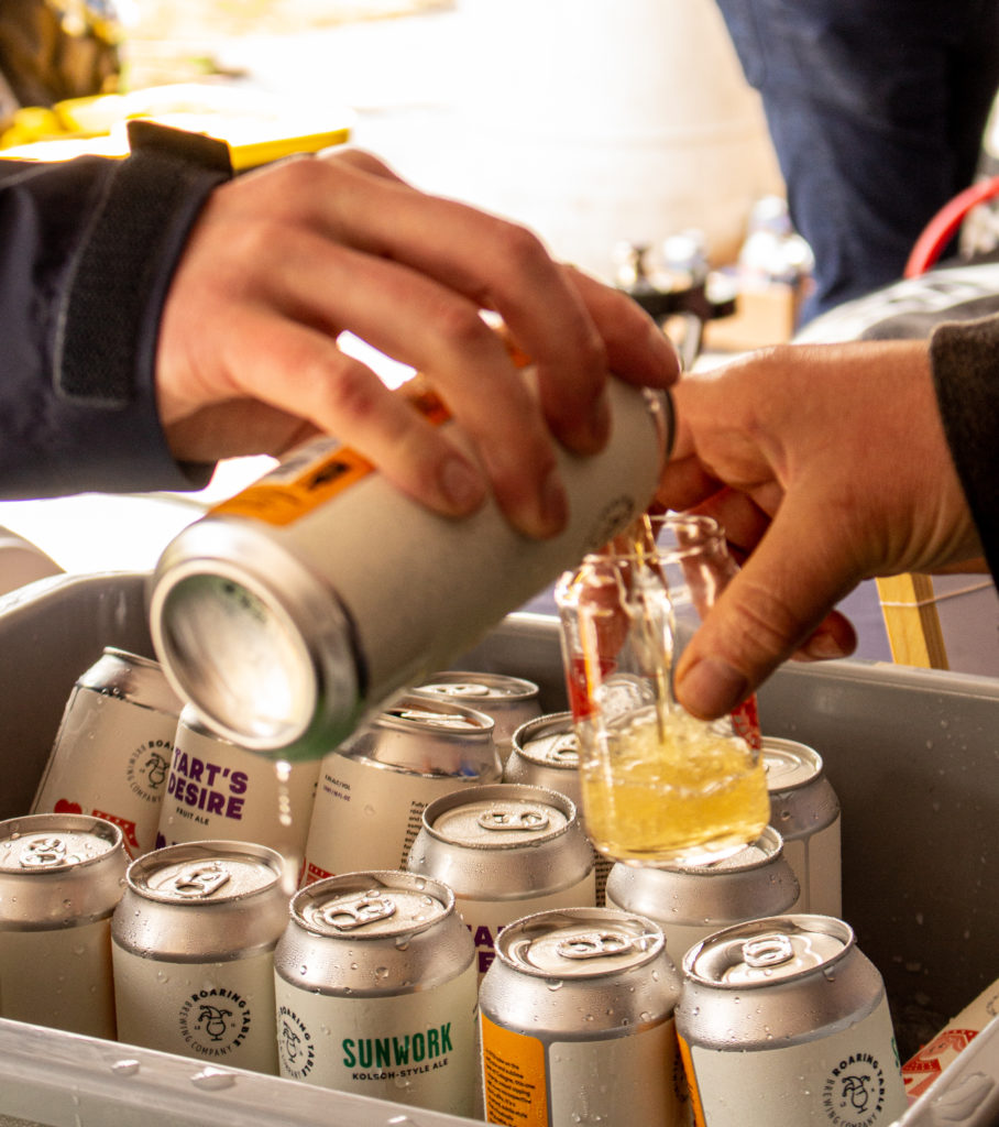 beer being poured at craft beer festival